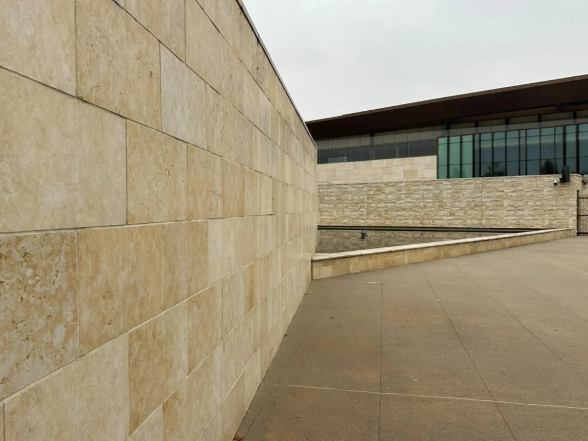 Exterior stone tile installation at Legacy Resort Hotel & Spa in Mission Valley, San Diego by Evolution Tile Inc