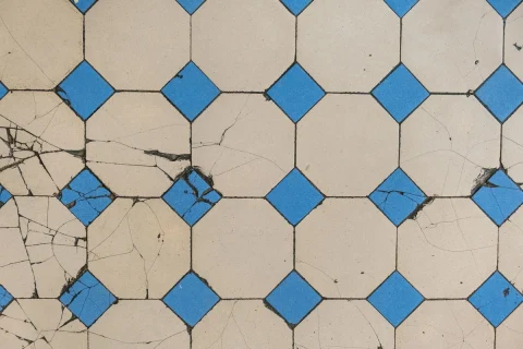Cracked octagon floor tile with blue accents